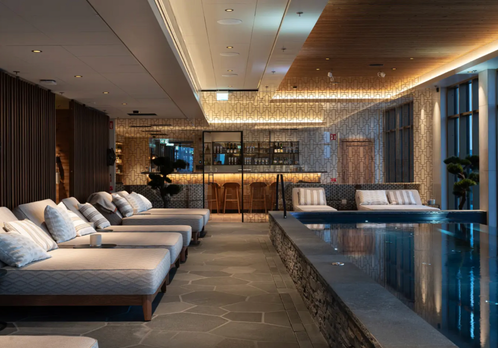 Relaxing spa with large windows overlooking Kiruna at Elite Hotel Frost